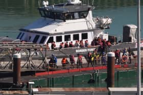 Migrants arrive at Dover Port after being picked up by a Border Force vessel earlier this month.