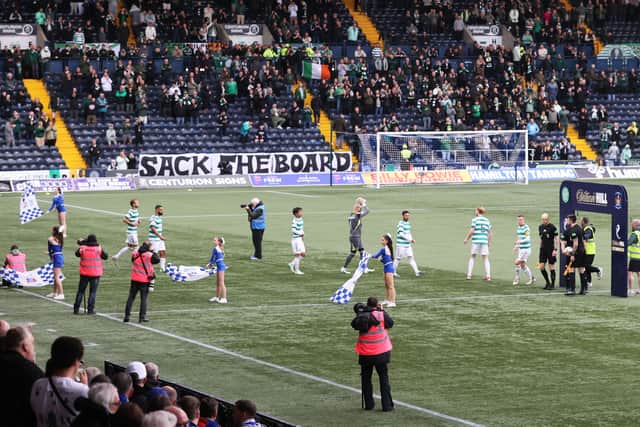 Celtic fans carry out a late entry protest against the board ahead of kick-off against Kilmarnock at Rugby Park. (Photo by Craig Williamson / SNS Group)