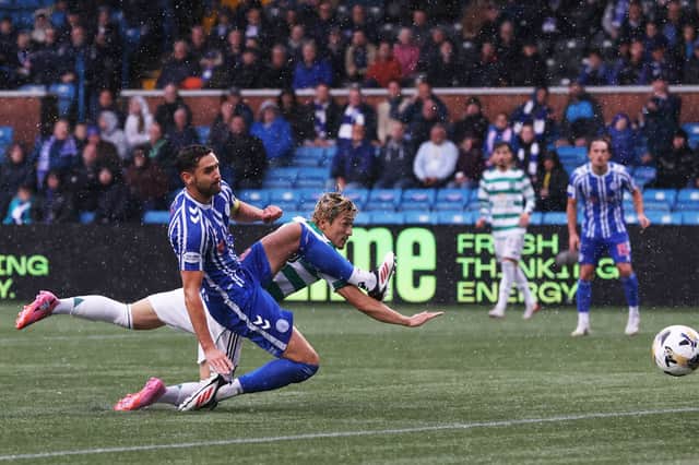 Daizen Maeda scores with a diving header to put Celtic 1-0 ahead at Kilmarnock. (Photo by Craig Williamson / SNS Group)