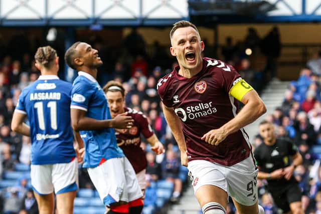 Hearts' Lawrence Shankland celebrates as he scores to make it 2-0 against Rangers at Ibrox.