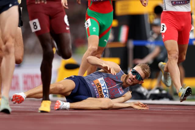 Josh Kerr falls to the ground after crossing the finish line during the Men's 1500m semi-finals on day three of the World Athletics Championships Tokyo 2025. (Photo by Christian Petersen/Getty Images)