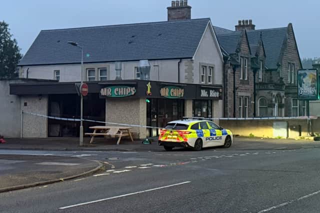 A cordon is also in place outside the takeaway Mr Chips.