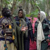 A self-styled "African tribe" has been evicted from privately-owned land in the Scottish Borders - and has moved over a small fence.