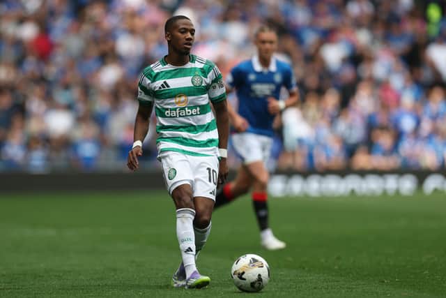 Celtic attacker Michel-Ange Balikwisha has joined Gent on loan.
