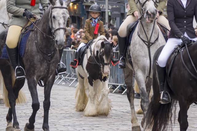 A young rider takes part in the Riding of the Marches in Edinburgh, a traditional inspection of the town's boundaries (Picture: Jane Barlow)