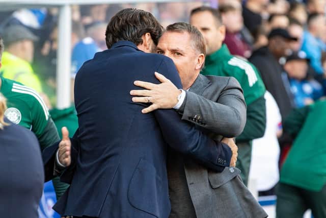 Celtic manager Brendan Rodgers embraces Rangers head coach Russell Martin during the recent Old Firm derby at Ibrox.