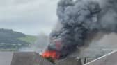A large smoke plume from a fire in Lochgelly rises into the sky.