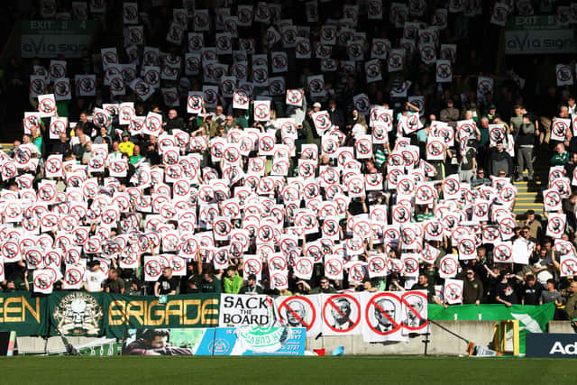 Celtic fans protest against the board with banners as the teams emerge ahead of the Premier Sports Cup quarter-final against Partick Thistle at Firhill. (Photo by Alan Harvey / SNS Group)