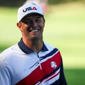 Bryson DeChambeau smiles during a practice round prior to the 45th Ryder Cup at Bethpage State Park in Farmingdale, New York