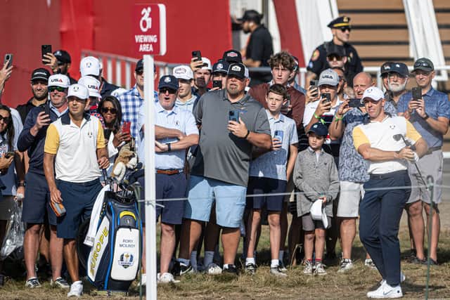 Rory McIlroy hits a shot at the opening hole during Team Europe’s first official practice round for the 45th Ryder Cup at Bethpage Black