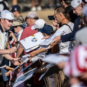 Team Europe’s Bob MacIntyre signs autographs during a practice round for the Ryder Cup at Bethpage Black on Tuesday 