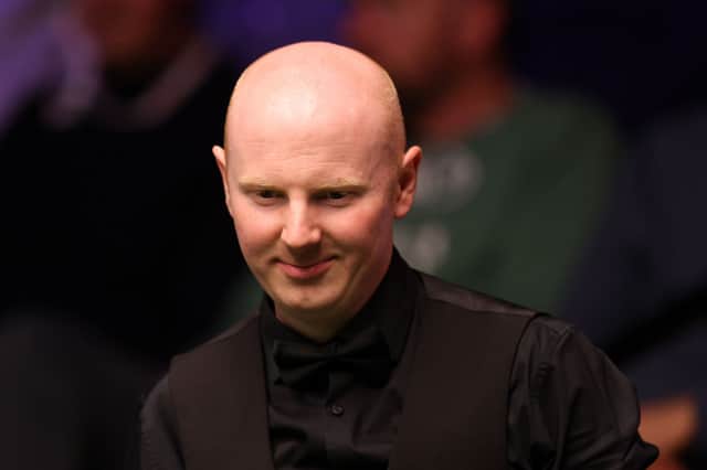 Scotland's Anthony McGill is through to the third round of the British Open snooker.