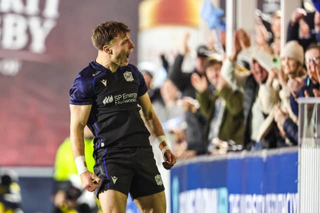 Glasgow Warriors' Jamie Dobie celebrates after scoring a second-half try.
