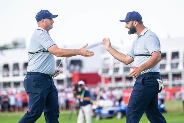 Team Europe’s Sepp Straka and Jon Rahm celebrate winning their afternoon foursomes match at Farmingdale in New York 