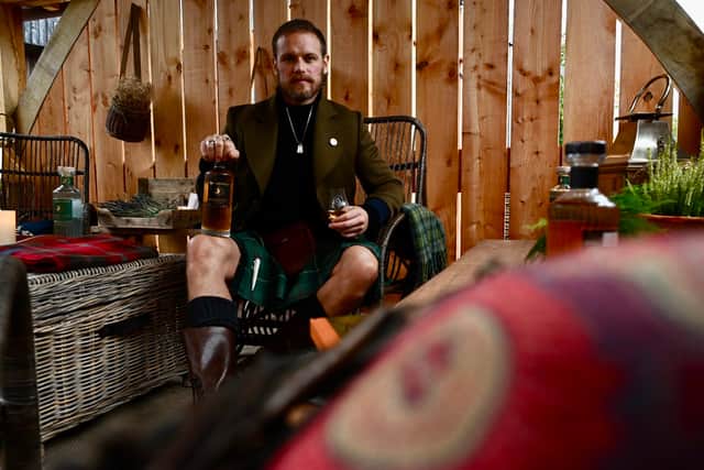 Sam Heughan at a bothy at the newly rebranded Galloway distillery