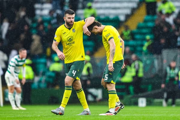 His defenders Grant Hanley (left) and Jack Iredale during the goalless draw at Celtic Park. (Photo by Ross MacDonald / SNS Group)