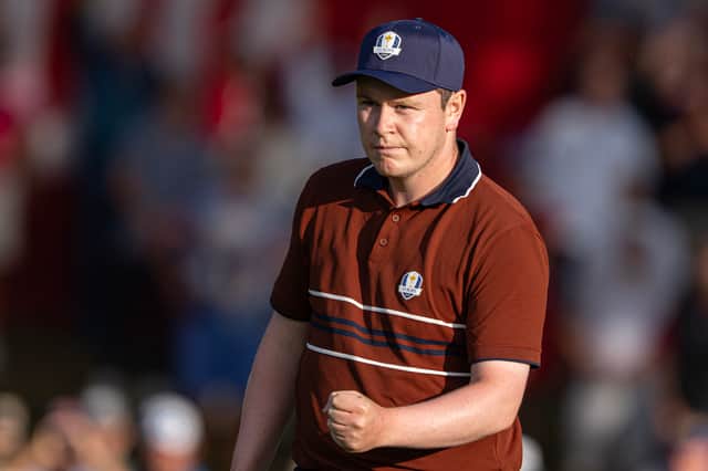 Team Europe’s Bob MacIntyre reacts after holing a birdie putt on the second hole during the Saturday foursomes in the 45th Ryder Cup in New York