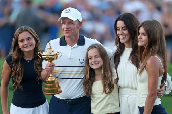 Luke Donald shows off the Ryder Cup with his wife and their three daughters after Team Europe’s win in the 45th edition at Bethpage State Park on Long Island