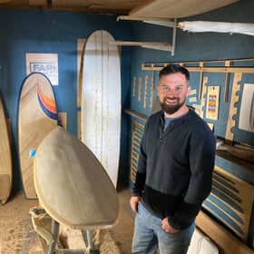 Wooden surfboard maker Frazer Reid in his workshop just outside Crail