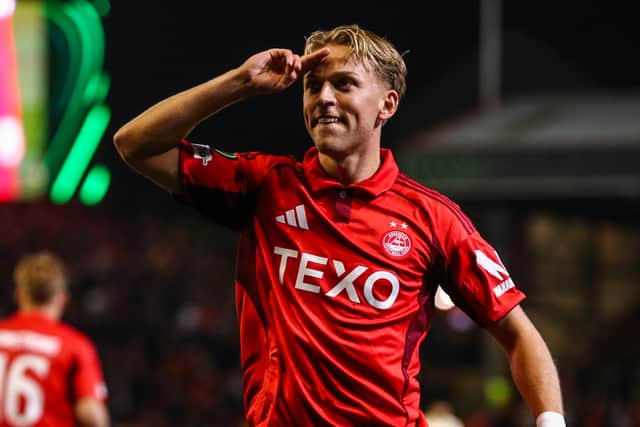 Jesper Karlsson salutes the Aberdeen fans after scoring against Shakhtar Donetsk.