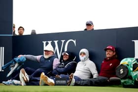 Both Open winners at St Andrews,  Louis Oosthuizen of  and Cameron Smith  wait on the fifth tee as play is suspended during round three of the Alfred Dunhill Links Championship 