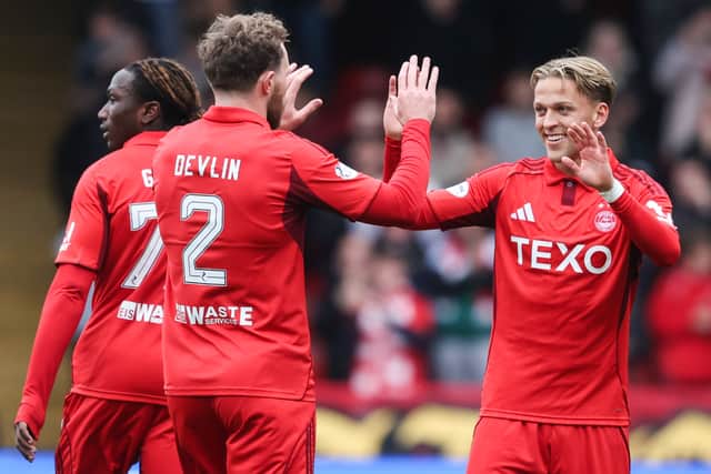 Jesper Karlsson scored twice as Aberdeen floored Dundee.