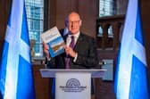 First Minister John Swinney, pictured with the new independence paper