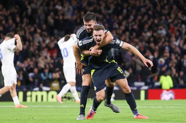Scotland's Lewis Ferguson celebrates with Grant Hanley as he scores to make it 2-1 over Greece at Hampden. (Photo by Craig Williamson / SNS Group)