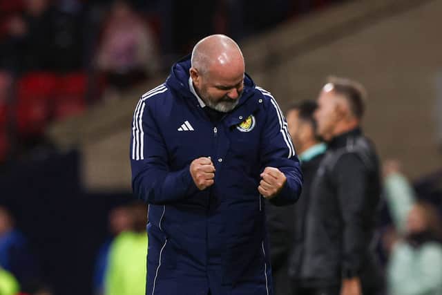 Scotland head coach Steve Clarke celebrates the win.