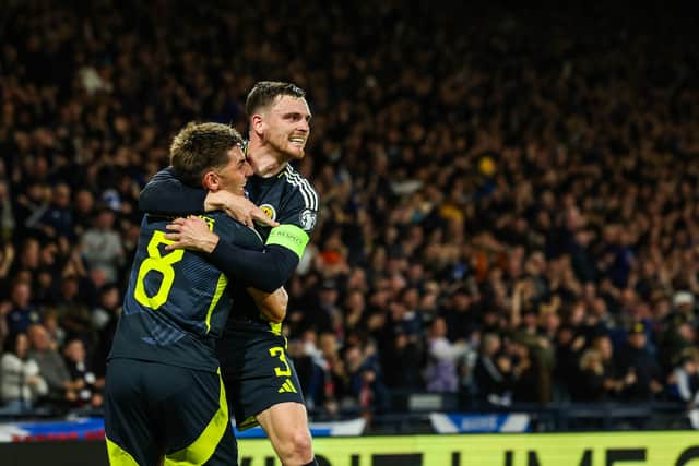 Andy Robertson and Billy Gilmour celebrate Scotland's huge win over Greece at Hampden.