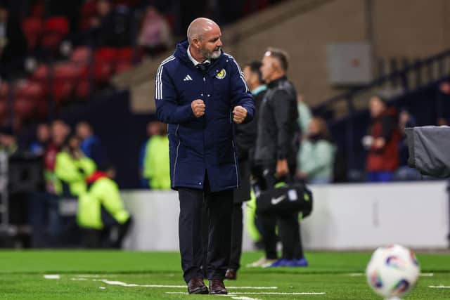 Steve Clarke celebrates Scotland's 3-1 win over Greece.