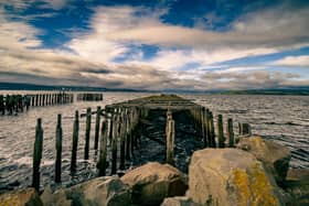 Beautiful dramatic skies over Craigendoran Pier, closed in 1972 and once a departure point for Clyde steamers like The Waverley