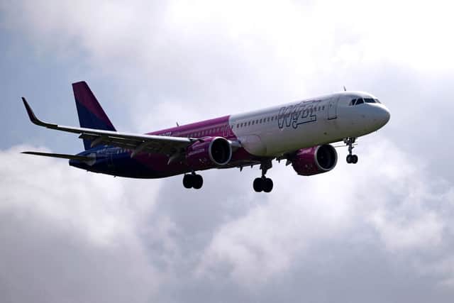 A Wizz Air jet comes in to land at Gatwick Airport. The airline will train 1,200 new pilots by 2028, including 240 based in the UK (Photo: BEN STANSALL/AFP via Getty Images)
