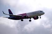 A Wizz Air jet comes in to land at Gatwick Airport. The airline will train 1,200 new pilots by 2028, including 240 based in the UK (Photo: BEN STANSALL/AFP via Getty Images)