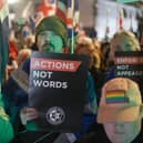 People take part in a demonstration outside Downing Street, Westminster, organised by the Campaign Against Antisemitism