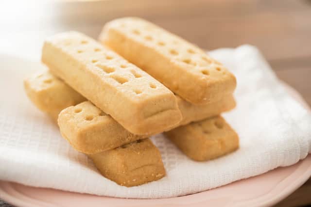 Shortbread is a biscuit that has evolved, rather by being invented by a single person - but there's no doubt that its history is completely Scottish. Originally a fairly tasteless 12th century twice-baked 'biscuit bread', the court bakers of Mary, Queen of Scots are credited with transforming it into a luxury snack by adding lashings of expensive butter and sugar in the 16th century. It's not changed much more in the last 500 years.