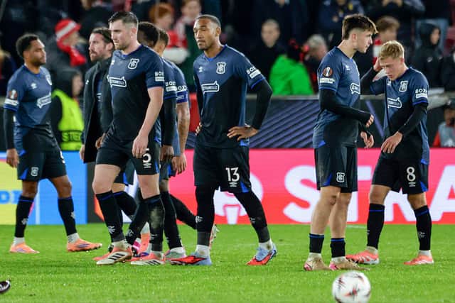 Rangers players depart the field following the 3-0 loss to SK Brann on Thursday.