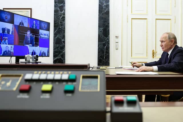 Vladimir Putin chairs a Security Council meeting via a videoconference at the Kremlin (ALEXANDER KAZAKOV/POOL/AFP via Getty Images)