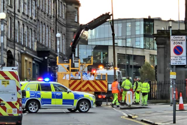 Edinburgh city centre roads were closed after police vehicles were involved in a crash.