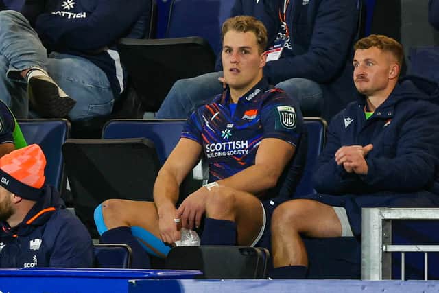 Edinburgh's Duhan van der Merwe watches from the stands after coming off injured against Benetton at Hive Stadium.