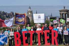 Campaigners gather on Edinburgh's Calton Hill at the launch of the Scotland Demands Better march (Picture: Jane Barlow)