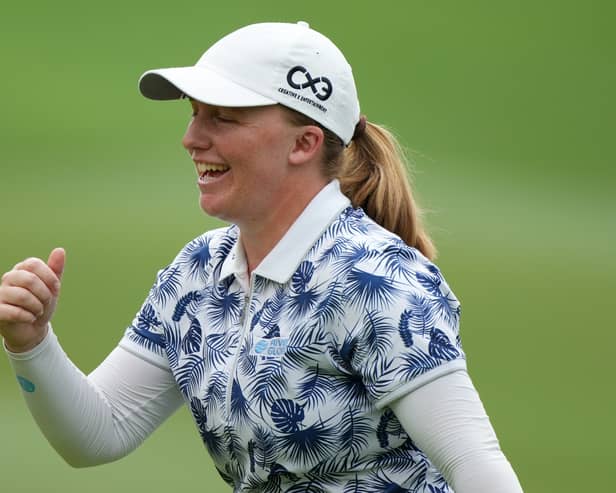 Gemma Dryburgh celebrates making a birdie during the first round of the Maybank Championship at Kuala Lumpur Golf & Country Club in Malaysia