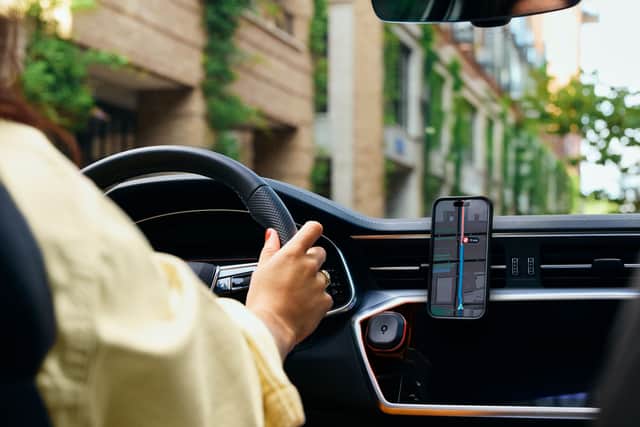 While it can be used alongside TomTom's apps, or Android Auto, there's really no need.