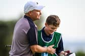James Morrison celebrates with his 13-year-old son Finley end of his third round in the Rolex Grand Final supported by The R&A at Club de Golf Alcanada in Alcudia 