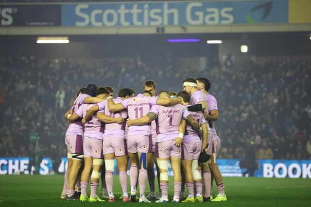 The Scotland team huddle together before the 85-0 win over USA.