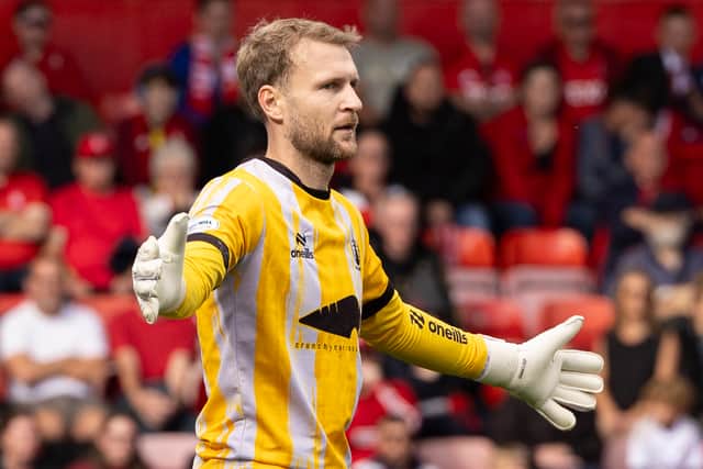 Scott Bain has been called into the Scotland squad after good form with Falkirk.