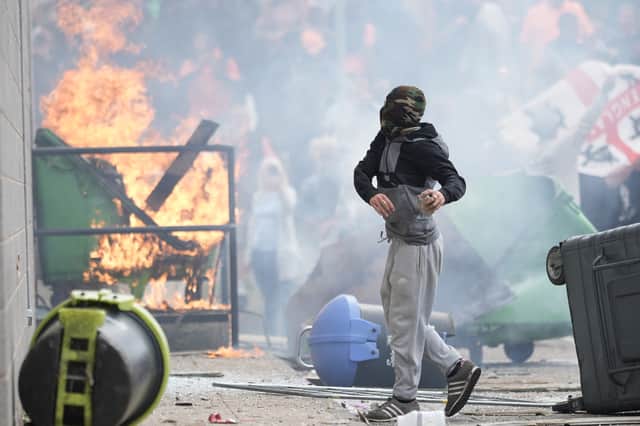 Violent riots at asylum hotels, mosques and other places broke out after the fatal stabbings of three young girls in Southport were falsely attributed to an asylum seeker (Picture: Christopher Furlong)