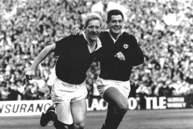 John Jeffrey and Gavin Hastings celebrate Scotland's famous 1990 Grand Slam victory over England at Murrayfield (image courtesy of Scottish Rugby)