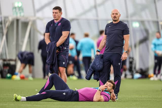 Head coach Gregor Townsend, right, and defence coach Lee Radford, left, with a relaxed Blair Kinghorn during a Scotland training session at the Oriam.