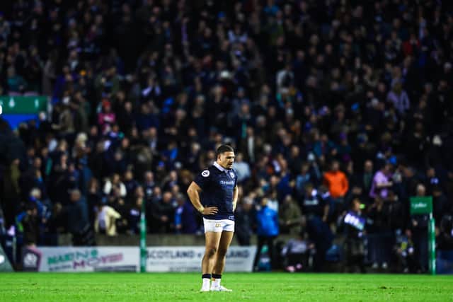 Scotland captain Sione Tuipulotu looks on dejectedly after the 25-17 defeat by New Zealand.